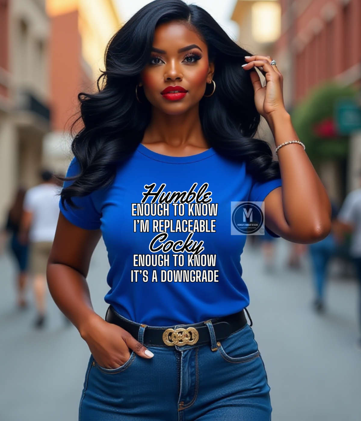 Woman wearing a blue t-shirt with text on a city street